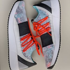 Under Armour Kids' White and Black Sneakers with Orange Accents